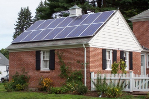 House with rooftop solar panels