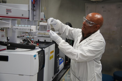 Solomon Bairai of Navarro-ATL prepares a Twister Stir Bar sample for analysis at the Hanford Site's 222-S Laboratory.