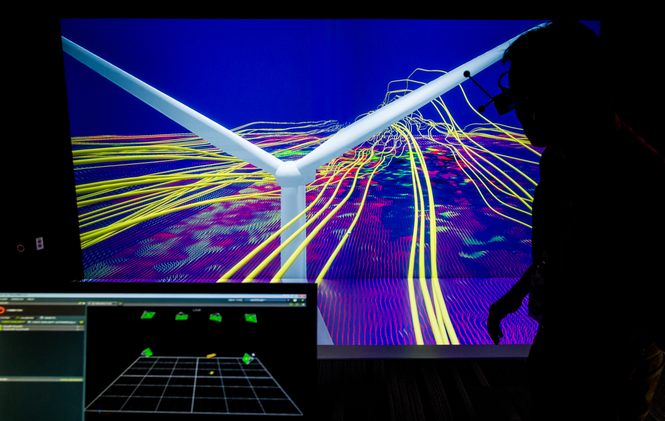 National Renewable Energy Laboratory Senior Scientist Kenny Gruchalla examines the velocity field from from a wind turbine simulation using a 3D model at the Energy Systems Integration Facility.