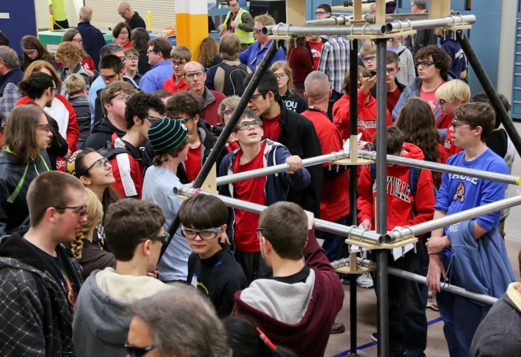 Last week, students from dozens of local Tennessee high schools gathered at Oak Ridge National Laboratory's Manufacturing Demonstration Facility to check out the game field that they'll be working with in the next six weeks. This year, the young engineers' challenges include building robots that can throw discs and climb pyramids. <a href="http://www.ornl.gov/info/features/get_feature.cfm?FeatureNumber=f20130107-00">Learn more</a> about the 2013 FIRST Robotics Competition. | Photo courtesy of Oak Ridge National Laboratory. Last week, students from dozens of local Tennessee high schools gathered at Oak Ridge National Laboratory's Manufacturing Demonstration Facility to check out the game field that they'll be working with in the next six weeks. This year, the young engineers' challenges include building robots that can throw discs and climb pyramids. <a href="http://www.ornl.gov/info/features/get_feature.cfm?FeatureNumber=f20130107-00">Learn more</a> about the 2013 FIRST Robotics Competition. | Photo courtesy of Oak Ridge National Laboratory.