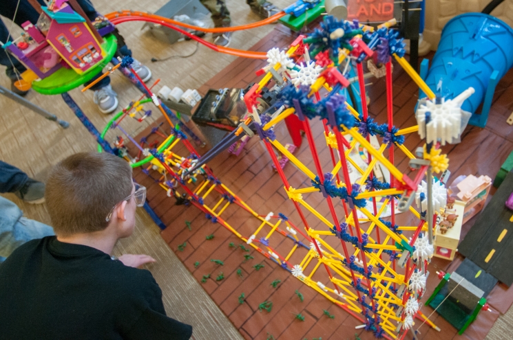 Last week, Argonne National Laboratory hosted the 18th annual Rube Goldberg Machine Contest, which gathered nine high school teams in a competition to build a series of simples tasks, combining the principles of physics and engineering. By using common objects like marbles and bicycle parts, the students were assigned to build a machine that takes at least 20 steps to hammer a nail. In this photo, members of a Hoffman Estates High School team works on assembling a Toyland-themed Rube Goldberg machine. Check out more <a href="http://www.flickr.com/photos/argonne/sets/72157633023662385/with/8568153243/" target="_blank">photos of the competition's complex and colorful Rube Goldberg machines</a>. | Photo courtesy of Argonne National Laboratory. Last week, Argonne National Laboratory hosted the 18th annual Rube Goldberg Machine Contest, which gathered nine high school teams in a competition to build a series of simples tasks, combining the principles of physics and engineering. By using common objects like marbles and bicycle parts, the students were assigned to build a machine that takes at least 20 steps to hammer a nail. In this photo, members of a Hoffman Estates High School team works on assembling a Toyland-themed Rube Goldberg machine. Check out more <a href="http://www.flickr.com/photos/argonne/sets/72157633023662385/with/8568153243/" target="_blank">photos of the competition's complex and colorful Rube Goldberg machines</a>. | Photo courtesy of Argonne National Laboratory.