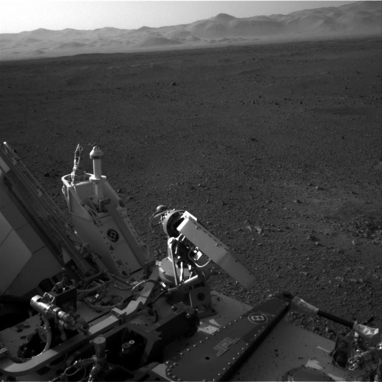 On Monday, August 6, 2012, NASA's Curiosity rover arrived on the surface of Mars to gather geological and environmental data to determine if the planet has ever had the potential to support life. This photo was taken by a navigation camera located toward the back-left of the Curiosity rover, and features part of the rover's nuclear <a href="/node/381709" target="_blank">power supply</a>. Beyond the rover itself, Curiosity's exploration reveals the desert-like terrain of Mars's Gale Crater. | Photo courtesy of NASA/JPL-Caltech. On Monday, August 6, 2012, NASA's Curiosity rover arrived on the surface of Mars to gather geological and environmental data to determine if the planet has ever had the potential to support life. This photo was taken by a navigation camera located toward the back-left of the Curiosity rover, and features part of the rover's nuclear <a href="/node/381709" target="_blank">power supply</a>. Beyond the rover itself, Curiosity's exploration reveals the desert-like terrain of Mars's Gale Crater. | Photo courtesy of NASA/JPL-Caltech.
