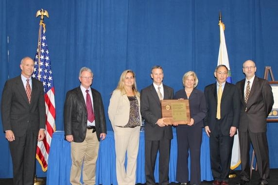 EM employees were part of the Uranium-233 (U-233) Disposition Alternatives Analysis team. Members of the team are pictured here with Secretary Chu, second from right, after receiving an Achievement Award Thursday. EM employees were part of the Uranium-233 (U-233) Disposition Alternatives Analysis team. Members of the team are pictured here with Secretary Chu, second from right, after receiving an Achievement Award Thursday.