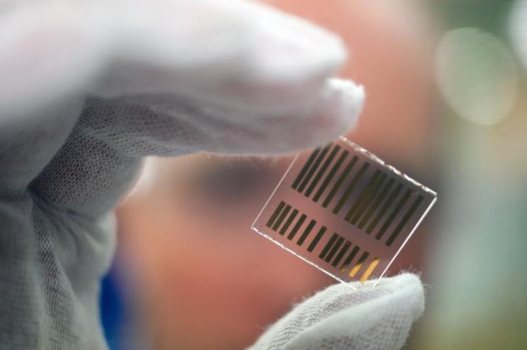 National Renewable Energy Laboratory scientists found multiple uses for thin film lithium ion conductors - for batteries and for solar cells. | Photo Courtesy of the National Renewable Energy Laboratory National Renewable Energy Laboratory scientists found multiple uses for thin film lithium ion conductors - for batteries and for solar cells. | Photo Courtesy of the National Renewable Energy Laboratory
