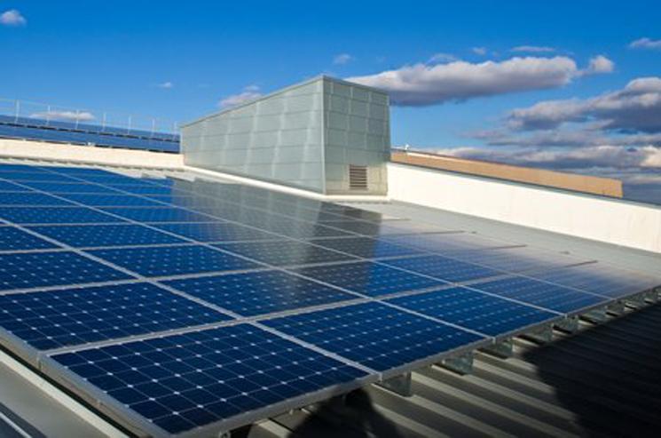Transphorm's gallium nitride semiconductors could be used to make operating photovoltaic panels, like these on the roof of the Research Support Facility, motor drives and transistors more energy efficient. | Photo courtesy of National Renewable Energy Laboratory.