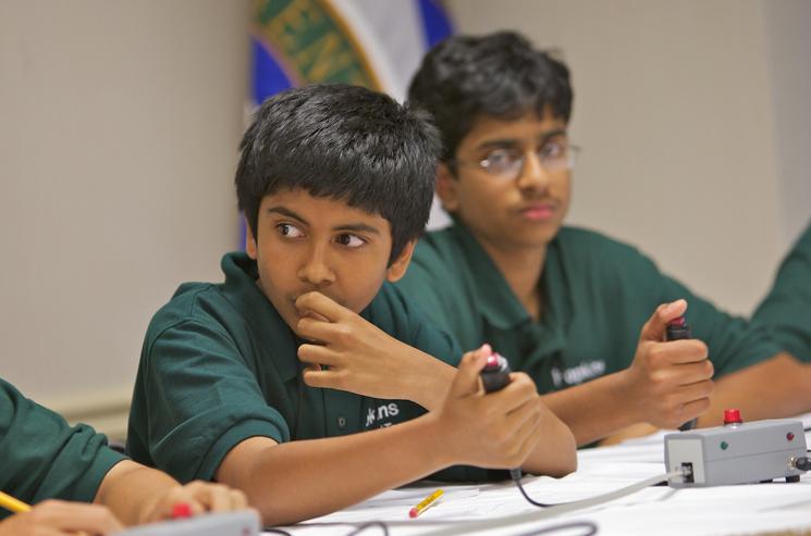 Hopkins Junior High School Team members, from Fremont, Calif., Raghu Dhara and Krishna Bharathal compete at the 2010 National Science Bowl for middle school students in Washington D.C. | Photo courtesy of John Troha, National Science Bowl. Hopkins Junior High School Team members, from Fremont, Calif., Raghu Dhara and Krishna Bharathal compete at the 2010 National Science Bowl for middle school students in Washington D.C. | Photo courtesy of John Troha, National Science Bowl.