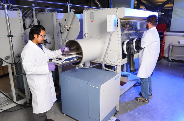 University of Idaho professor Supathorn Phongikaroon works with a graduate student in the radiochemistry lab at the Center for Advanced Energy Studies in Idaho Falls, Idaho. Phongikaroon has received $820,000 from DOE to study an applied technology to remotely analyze spent nuclear fuel. | Photo courtesy of the University of Idaho. University of Idaho professor Supathorn Phongikaroon works with a graduate student in the radiochemistry lab at the Center for Advanced Energy Studies in Idaho Falls, Idaho. Phongikaroon has received $820,000 from DOE to study an applied technology to remotely analyze spent nuclear fuel. | Photo courtesy of the University of Idaho.