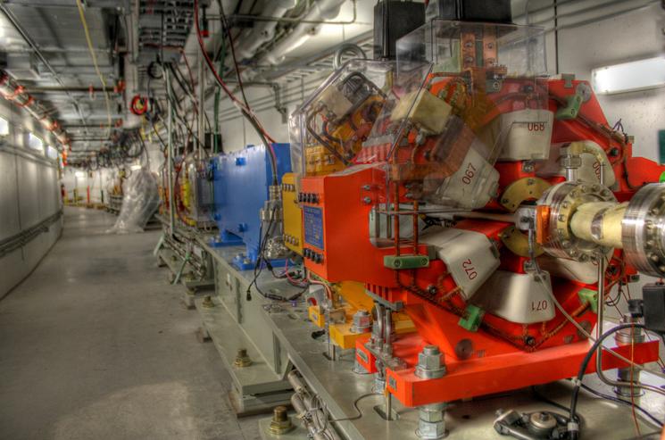 Brookhaven’s National Synchrotron Light Source x-ray beamline was used to reveal the atomic structure of the bioremediation enzyme. The liquid nitrogen in the foreground keeps the crystallized enzyme cool, protecting it from the heat of the x-rays that would otherwise damage the crystal. | Photo by Brookhaven National Laboratory Brookhaven’s National Synchrotron Light Source x-ray beamline was used to reveal the atomic structure of the bioremediation enzyme. The liquid nitrogen in the foreground keeps the crystallized enzyme cool, protecting it from the heat of the x-rays that would otherwise damage the crystal. | Photo by Brookhaven National Laboratory