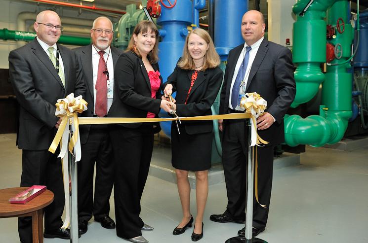 Officials from the Energy Department and NORESCO cut the ribbon at the new chiller plant in the Forrestal building. The chiller is expected to save $600,000 per year from the Department's energy bills. | Energy Department photo Officials from the Energy Department and NORESCO cut the ribbon at the new chiller plant in the Forrestal building. The chiller is expected to save $600,000 per year from the Department's energy bills. | Energy Department photo