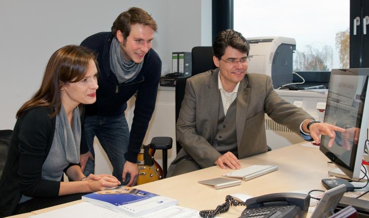 Serena DeBeer of Cornell University and the Max Planck Institute for Bioinorganic Chemistry, led the the team that performed crucial experiments at SLAC. Dr. DeBeer is pictured above with Michael Roemelt and Frank Neese, also of the Max Planck Institute. <a href = "https://news.slac.stanford.edu/image/nitrogenese-enzyme-model">Click here to see a photo of the nitrogenase enzyme</a>. Serena DeBeer of Cornell University and the Max Planck Institute for Bioinorganic Chemistry, led the the team that performed crucial experiments at SLAC. Dr. DeBeer is pictured above with Michael Roemelt and Frank Neese, also of the Max Planck Institute. <a href = "https://news.slac.stanford.edu/image/nitrogenese-enzyme-model">Click here to see a photo of the nitrogenase enzyme</a>.