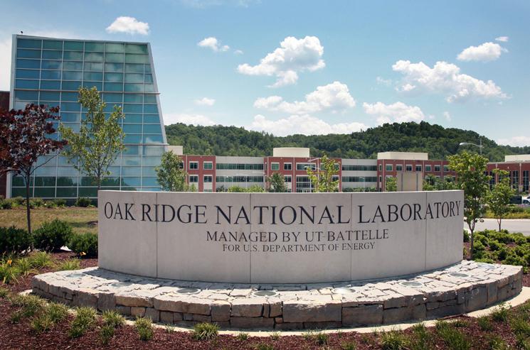 Oak Ridge National Laboratory’s main entrance is marked by a limestone sign. Several new buildings visible in the background house more than 1,000 of the lab’s 4,300 employees. | Photo courtesy of Oak Ridge National Laboratory Oak Ridge National Laboratory’s main entrance is marked by a limestone sign. Several new buildings visible in the background house more than 1,000 of the lab’s 4,300 employees. | Photo courtesy of Oak Ridge National Laboratory