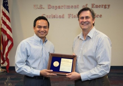 Department of Energy Carlsbad Field Office Site Operations Director Casey Gadbury (right) presents Farok Sharif, President and Project Manager for Nuclear Waste Partnership LLC, the management and operating contractor at the Waste Isolation Pilot Plant, with a 2012 DOE Sustainability Award during a recognition event at WIPP. More than 20 CBFO and contractor employees were recognized with sustainability awards in four categories. Department of Energy Carlsbad Field Office Site Operations Director Casey Gadbury (right) presents Farok Sharif, President and Project Manager for Nuclear Waste Partnership LLC, the management and operating contractor at the Waste Isolation Pilot Plant, with a 2012 DOE Sustainability Award during a recognition event at WIPP. More than 20 CBFO and contractor employees were recognized with sustainability awards in four categories.