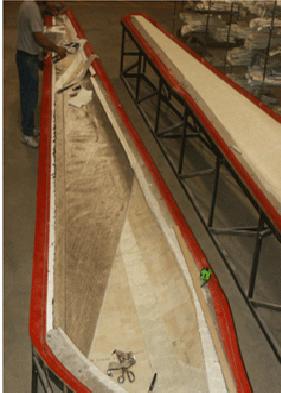 Researchers at the University of Massachusetts Lowell work on a wind blade project. | Photo courtesy of University of Massachusetts Lowell Researchers at the University of Massachusetts Lowell work on a wind blade project. | Photo courtesy of University of Massachusetts Lowell