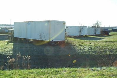 Old trailers that had sat for decades in the southwestern part of the Paducah site were cut up and placed in containers so that the debris could be placed in the site’s industrial landfill. Old trailers that had sat for decades in the southwestern part of the Paducah site were cut up and placed in containers so that the debris could be placed in the site’s industrial landfill.