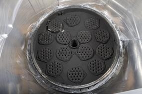 Pictured here is the Integrated Waste Treatment Unit's off-gas filter following the June incident. Pictured here is the Integrated Waste Treatment Unit's off-gas filter following the June incident.