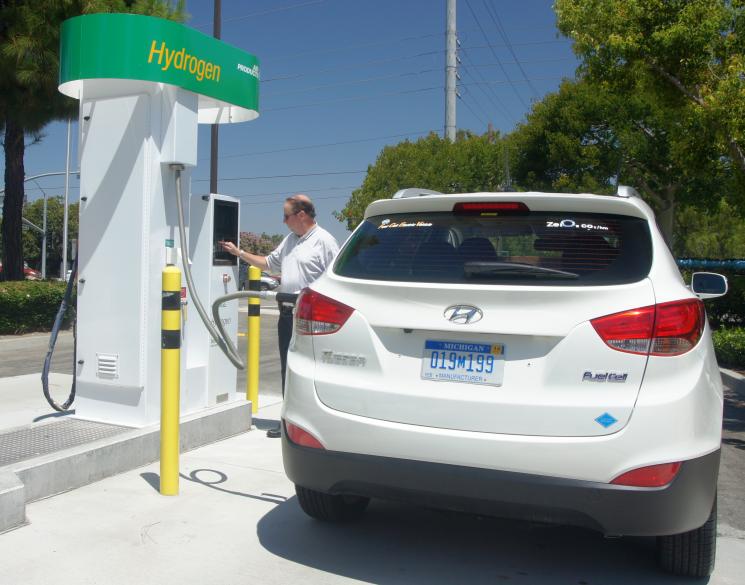 A customer fills up at a new Energy Department supported fuel cell hydrogen energy station in Fountain Valley, California. | Photo courtesy of Air Products and Chemicals. A customer fills up at a new Energy Department supported fuel cell hydrogen energy station in Fountain Valley, California. | Photo courtesy of Air Products and Chemicals.