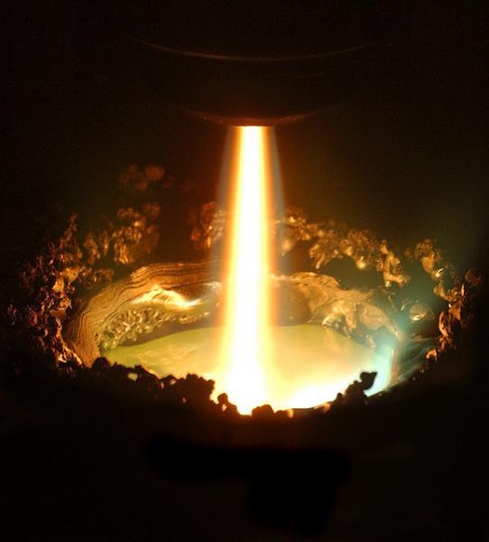 The plasma torch in the Retech plasma furnace is one tool used in Materials Preparation Center to create ultra-high purity metal alloy samples, particularly rare-earth metals, located at the Ames Lab. | Photo Courtesy of the Ames Lab Flickr The plasma torch in the Retech plasma furnace is one tool used in Materials Preparation Center to create ultra-high purity metal alloy samples, particularly rare-earth metals, located at the Ames Lab. | Photo Courtesy of the Ames Lab Flickr