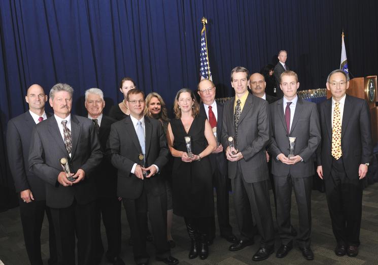 The BA-350 Spent Fuel Disposition Program Team with Secretary Steven Chu as they receive a Secretary of Energy Achievement Award. | Photo courtesy of the Energy Department