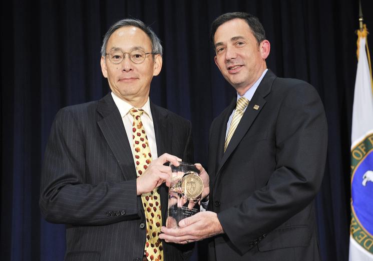 Robert Brese, Deputy Chief Information Officer in the Office of the Chief Information Officer with Secretary Steven Chu as he receives a Secretary of Energy Excellence Award. | Photo courtesy of the Energy Department