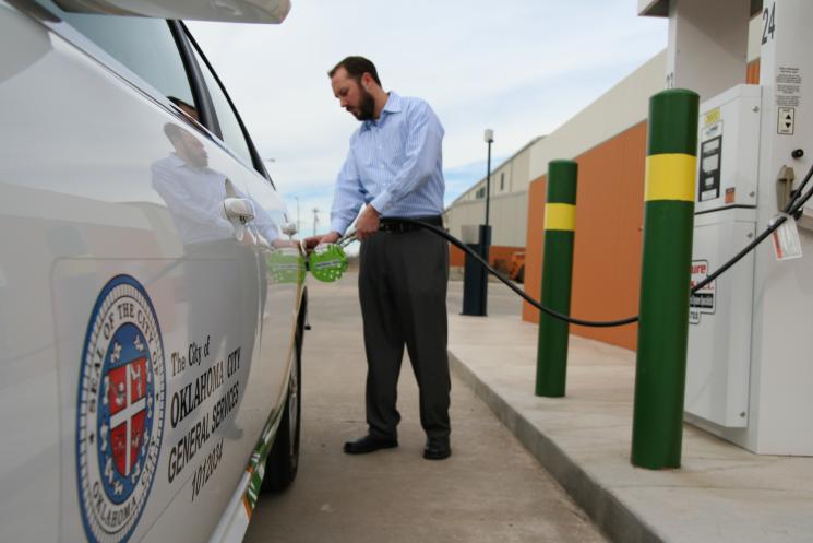 Andy Mitchell, Public Works Project Manager for the City of Oklahoma City, refills a vehicle at the new fast-fill CNG fueling station located at the city's main maintenance facility. | Courtesy of the City of Oklahoma City. Andy Mitchell, Public Works Project Manager for the City of Oklahoma City, refills a vehicle at the new fast-fill CNG fueling station located at the city's main maintenance facility. | Courtesy of the City of Oklahoma City.