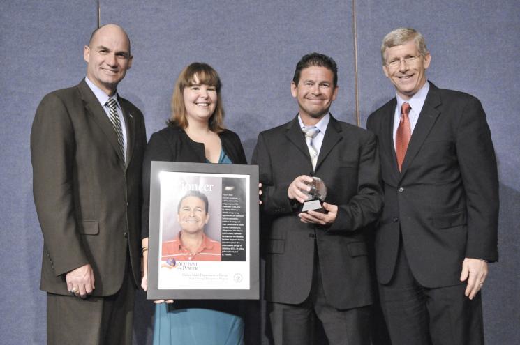 Under Secretary for Nuclear Security Tom D’Agostino, Sustainability Performance Office Director Jennifer MacDonald, Chris Evans and Deputy Secretary of Energy and Daniel Poneman at the 2011 Sustainability Awards. | Image courtesy of the Energy Department 
 