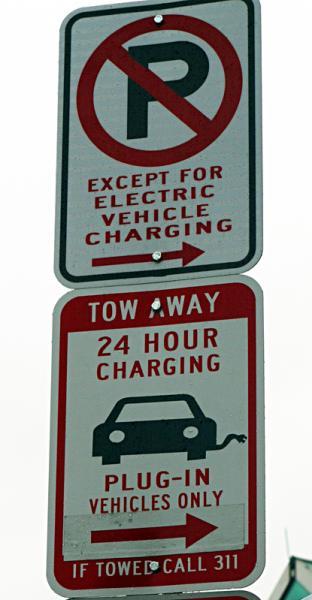 Street signage for Washington, DC's first electric vehicle charging station located on the northwest corner of the intersection of U and 14th streets. | Department of Energy Photo | Street signage for Washington, DC's first electric vehicle charging station located on the northwest corner of the intersection of U and 14th streets. | Department of Energy Photo |