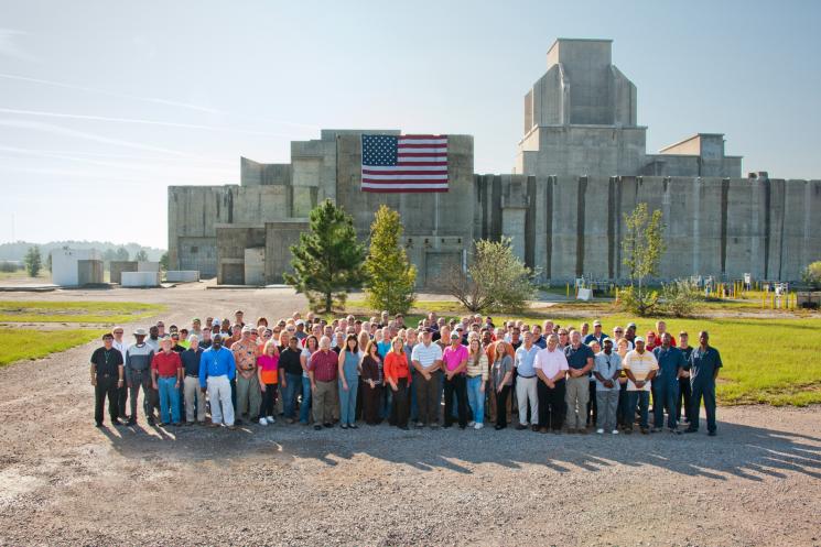 The Savannah River Site Recovery Act Program workforce stands in front of the P Reactor, which was deactivated and decommissioned as one of the American Recovery and Reinvestment Act-funded projects across America. | Photo courtesy of the Office of Environmental Management.
The Savannah River Site Recovery Act Program workforce stands in front of the P Reactor, which was deactivated and decommissioned as one of the American Recovery and Reinvestment Act-funded projects across America. | Photo courtesy of the Office of Environmental Management.