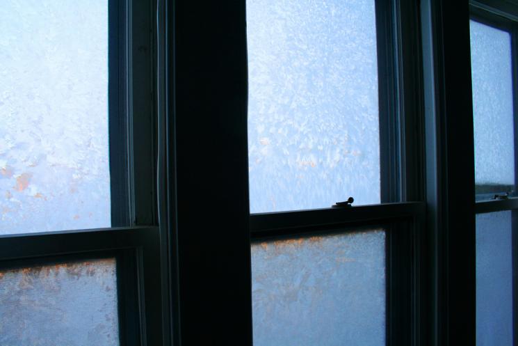 The frost patterns on your window might be pretty, but they're not helping you save any energy. Energy efficient windows provide an effective barrier from inclement weather. | Photo courtesy of <a href="http://www.flickr.com/photos/machineisorganic/4174555202/"> Callie Reed</a>.