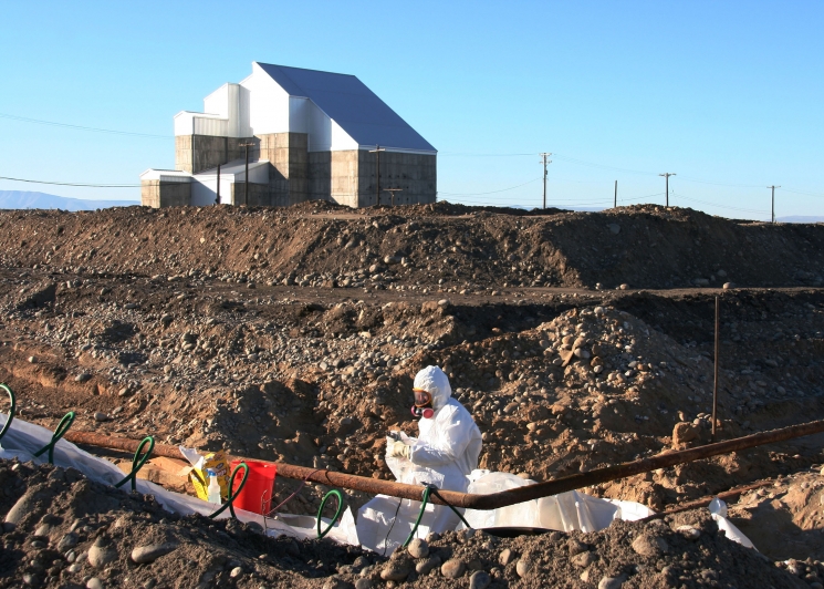 A worker cuts and drains pipe at a waste site in F Area. The pipe contained sodium dichromate, which was used as an anti-corrosion agent. A worker cuts and drains pipe at a waste site in F Area. The pipe contained sodium dichromate, which was used as an anti-corrosion agent.