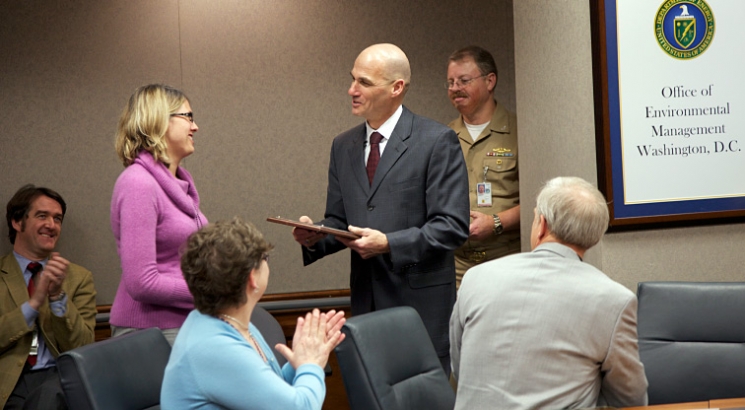 Thomas D’Agostino, right, who retired this month as Under Secretary for Nuclear Security and NNSA Administrator, presents EM’s Candice Trummell with the NNSA Gold Medal earlier this month. Thomas D’Agostino, right, who retired this month as Under Secretary for Nuclear Security and NNSA Administrator, presents EM’s Candice Trummell with the NNSA Gold Medal earlier this month.