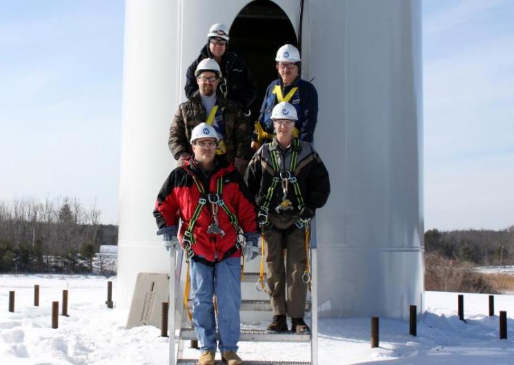 Mount Wachusett Community College staff Bill Swift, Bob LaBonte, Norm Boudreau, George Couillard and Vestas trainer Bill Fulkerson about to ascend the MWCC north wind turbine | Photo courtesy of GreenOnGreenStreet Mount Wachusett Community College staff Bill Swift, Bob LaBonte, Norm Boudreau, George Couillard and Vestas trainer Bill Fulkerson about to ascend the MWCC north wind turbine | Photo courtesy of GreenOnGreenStreet