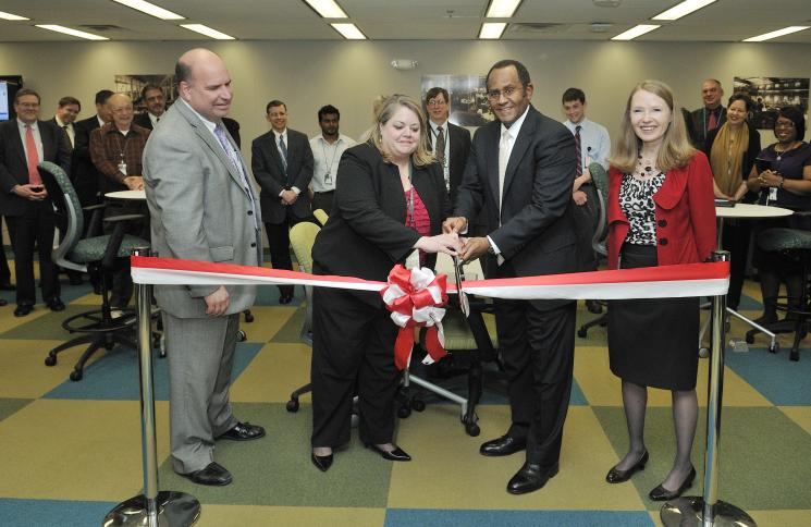 Peter O’Konski, Director for the Department’s Office of Administration; Lauren Hall, Office of Administration; Mel Williams, Associate Deputy Secretary and Director of the Office of Management, Ingrid Kolb cut the ribbon on the new Headquarters Mobile Work Center. | Energy Department file photo, credit Ken Shipp. Peter O’Konski, Director for the Department’s Office of Administration; Lauren Hall, Office of Administration; Mel Williams, Associate Deputy Secretary and Director of the Office of Management, Ingrid Kolb cut the ribbon on the new Headquarters Mobile Work Center. | Energy Department file photo, credit Ken Shipp.