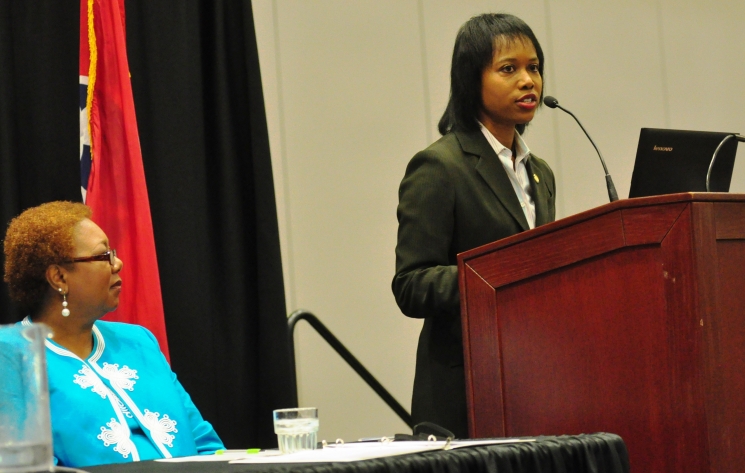 Freda Hopper serves as a Small Business Program Manager at Oak Ridge Operations Office, helping small businesses learn how to work with the Department and access contract opportunities. Here, she joins Dot Harris (at podium) at a Small Business Summit in Oak Ridge this July.