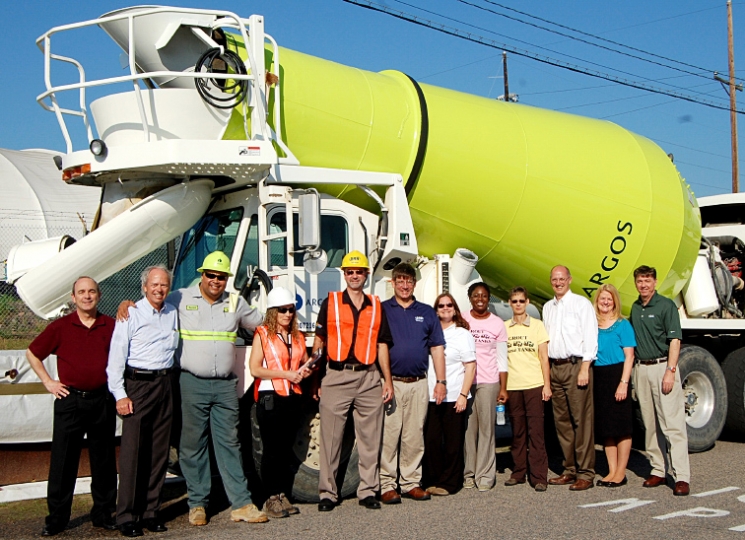 DOE and Savannah River Remediation team members gather in front of the first cement truck containing grout for Tank 18 at the Savannah River Site. DOE and Savannah River Remediation team members gather in front of the first cement truck containing grout for Tank 18 at the Savannah River Site.