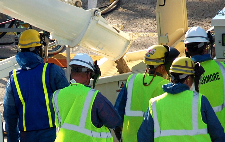 A specially formulated grout was poured into a hopper and transferred through lines to Tank 19. A specially formulated grout was poured into a hopper and transferred through lines to Tank 19.