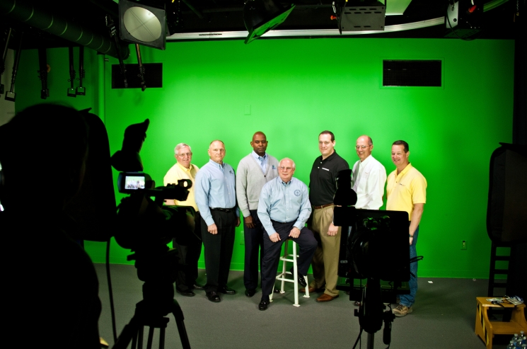 Top executives from all major contractors at the Savannah River Site and DOE Savannah River Operations Office Manager David Moody (seated) work together to create a video production promoting the “Safety Begins with Me” program. Top executives from all major contractors at the Savannah River Site and DOE Savannah River Operations Office Manager David Moody (seated) work together to create a video production promoting the “Safety Begins with Me” program.