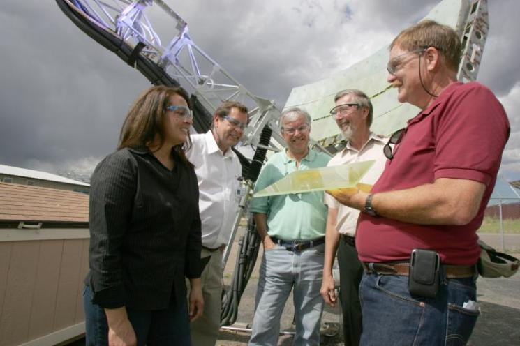 NREL's Ultra-Accelerated Weathering System tests products for outdoor durability. (left to right), Judy Netter, NREL; Henry Hardcastle, Atlas Material Testing Technology; and Al Lewandowski, Gary Jorgensen and Carl Bingham of NREL.  | Photo Courtesy of Joe Poellot
