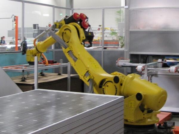 A robot works on crystalline solar cells at Wisconsin-based Helios USA, LLC. The opening of the manufacturing plant has supported 26 jobs and is projected to create a total of 50 permanent jobs in the state and was supported through a State Energy Program loan. | Courtesy of Helios USA, LLC.