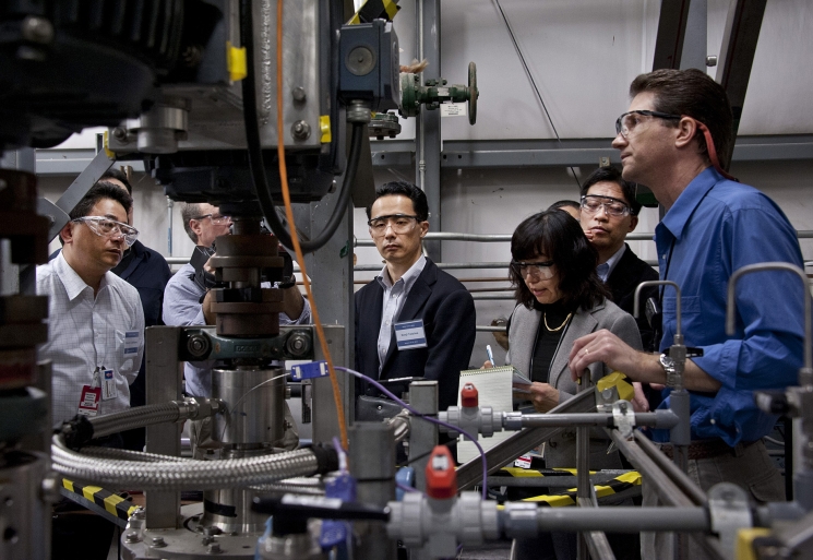 Savannah River National Laboratory scientist Dave Herman (right) discusses waste management equipment during a visit by Japanese scientists involved in the cleanup at Japan's Fukushima nuclear plant. Savannah River National Laboratory scientist Dave Herman (right) discusses waste management equipment during a visit by Japanese scientists involved in the cleanup at Japan's Fukushima nuclear plant.