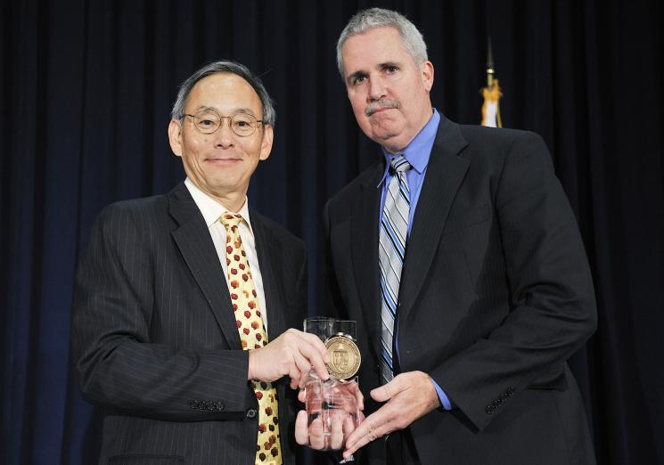 Thomas Staker, Deputy Director for Oversight in the Office of Enforcement and Oversight with Secretary Steven Chu as he receives a Secretary of Energy Excellence Award. | Photo courtesy of the Energy Department