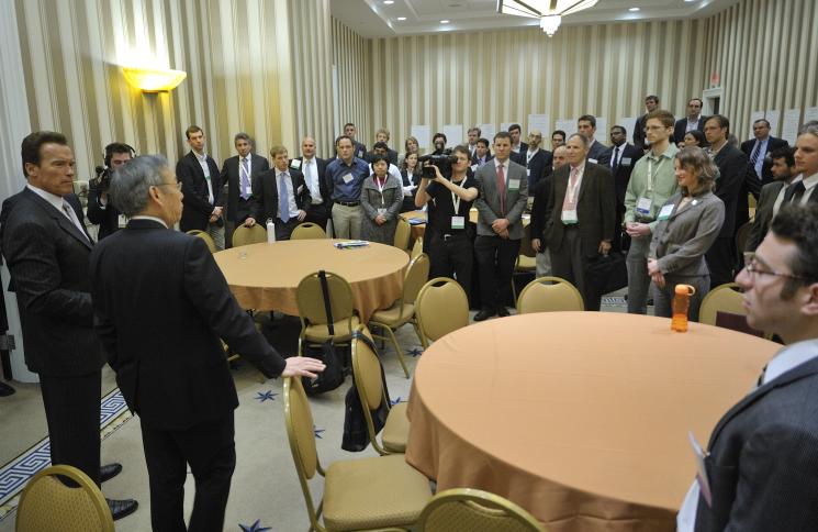 Secretary Chu and former Governor of California Arnold Schwarzenegger speak with students at the 2011 Energy Innovation Summit. | Photo courtesy of ARPA-E.