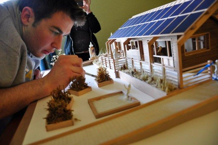 Team Massachusetts' Project Manager Spencer Culhane puts the finishing touches on the team's design model. | Courtesy of the Team Massachusetts Flickr photostream