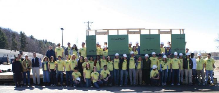 The Self-Reliance team at their recent "wall-raising" event. | Photo Courtesy of the Middlebury Solar Decathlon team