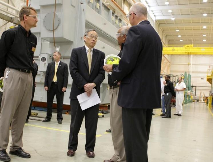 Employees of the Waukesha Electric Systems give Secretary Chu a tour of the transformer manufacturing plant. | Courtesy of Waukesha Electric Systems