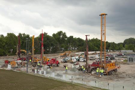 Workers drill boreholes for a geothermal heating and cooling system at Ball State University’s campus in Muncie, Ind. | Photo courtesy of Ball State University Workers drill boreholes for a geothermal heating and cooling system at Ball State University’s campus in Muncie, Ind. | Photo courtesy of Ball State University