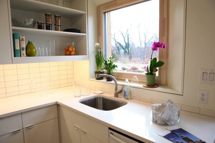 Energy efficient appliances in the kitchen help reduce the home's energy consumption. For more photos of the Empowerhouse ribbon cutting, <a href="/node/580963">view our photo gallery</a>. | Photo courtesy of Sarah Gerrity, Energy Department.