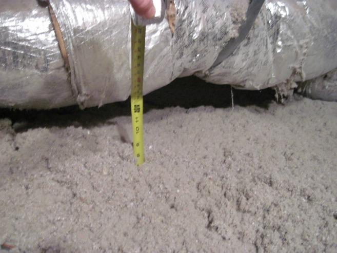 Adding insulation in the attic of an existing home often results in a favorable payback. | Photo courtesy of Lieko Earle, NREL PIX 19612.
Adding insulation in the attic of an existing home often results in a favorable payback. | Photo courtesy of Lieko Earle, NREL PIX 19612.