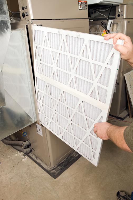Changing filters regularly is an important part of maintaining a heat pump system. | Photo courtesy of ©iStockphoto/BanksPhotos
