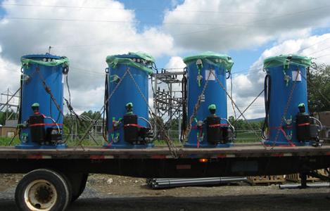 Seven-foot tall cylinders equipped with flywheel technology (shown above) will make up Beacon Power’s energy storage plant in Stephentown, N.Y. The company received a $43 million loan guarantee from the Energy Department to build the plant. | Photo courtesy of Beacon Power Corporation Seven-foot tall cylinders equipped with flywheel technology (shown above) will make up Beacon Power’s energy storage plant in Stephentown, N.Y. The company received a $43 million loan guarantee from the Energy Department to build the plant. | Photo courtesy of Beacon Power Corporation