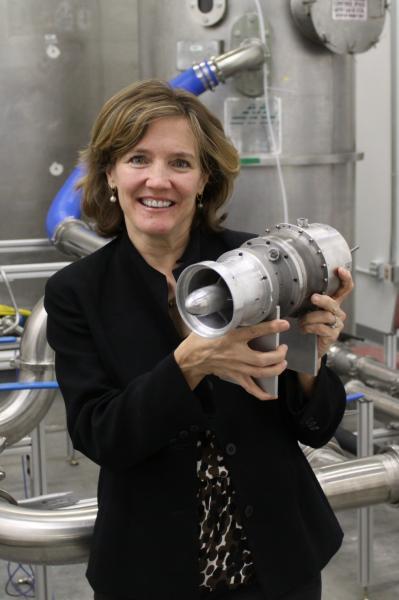 Shirley Coates Brostmeyer holds FTT’s twin-spool turbofan, the most efficient micro-turbine of its size | credit Frank Serio